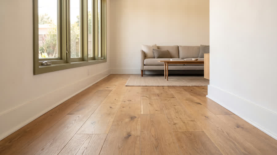 CADU interior showing six-inch engineered oak with a taller baseboard.